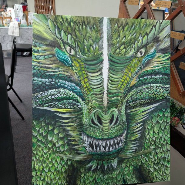 Close up green dragon eye painting